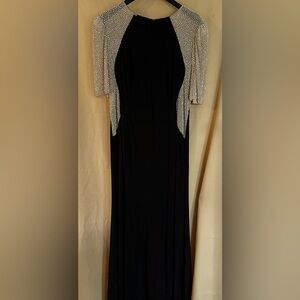 Mother of the groom Xscape evening dress. Beautiful on and very comfortable.